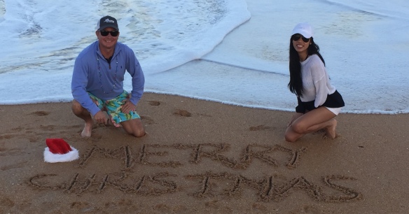 Jason and Jen wishing everyone Merry Christmas from the beach on Facebook . . .